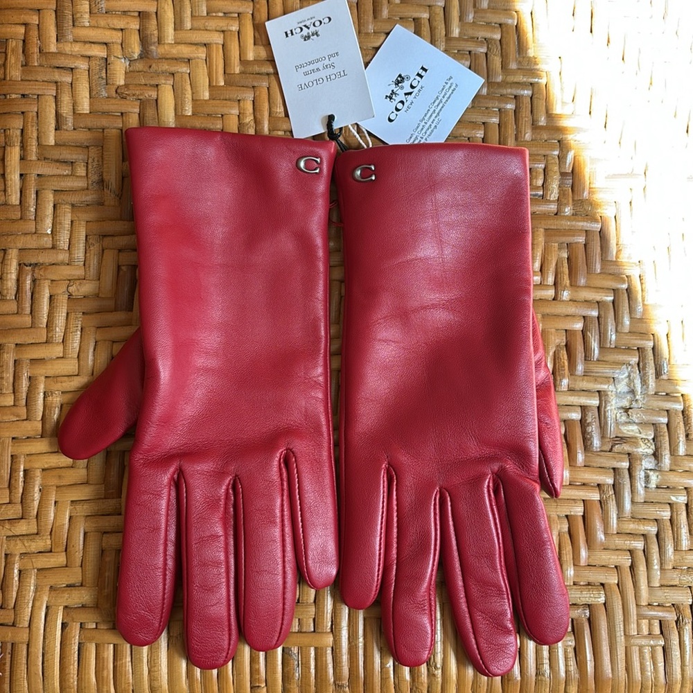 NEW Coach Red Sheep Leather Tech Gloves. 
Woman’s size 6 1/2. Lining 100% wool.
